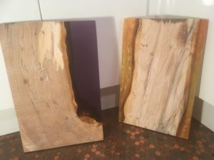 Resin boards created using a reusable container for resin pours